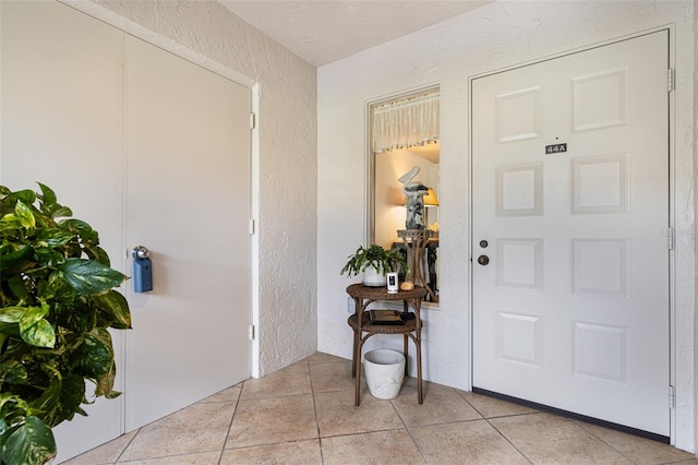 view of tiled entrance foyer