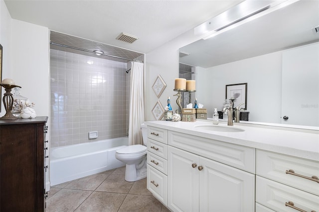 full bathroom featuring vanity, toilet, tile patterned floors, and shower / bath combo with shower curtain