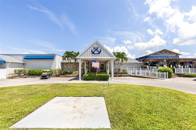 view of front of home with a front lawn and a porch