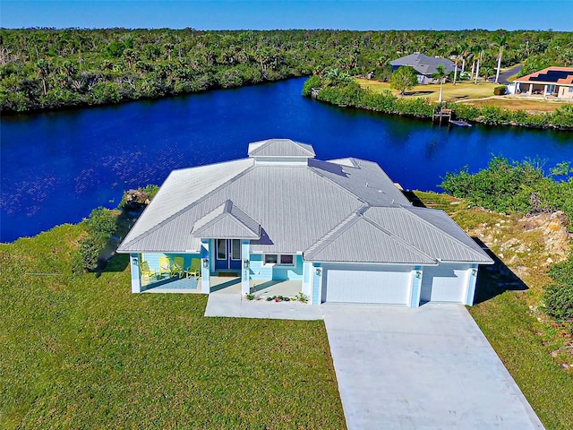 drone / aerial view with a water view