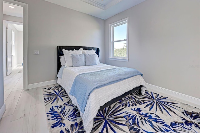 bedroom featuring light wood-type flooring