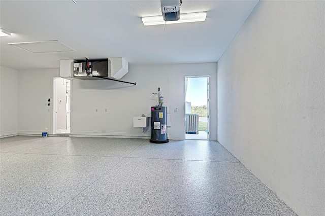 garage featuring a garage door opener and water heater