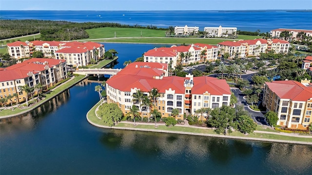 drone / aerial view featuring a water view