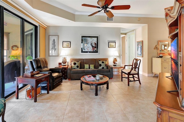 living room featuring ceiling fan, light tile patterned flooring, and ornamental molding