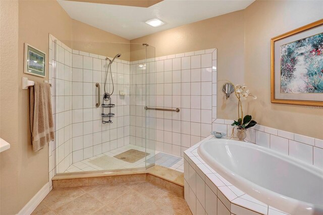 bathroom with plus walk in shower and tile patterned floors