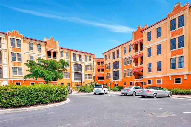 96 Vivante Blvd Unit 96211, Punta Gorda, FL 33950 - view of building exterior with uncovered parking