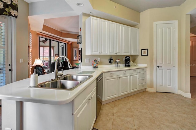 96 Vivante Blvd Unit 96211, Punta Gorda, FL 33950 - kitchen with white cabinets, light countertops, light tile patterned floors, a peninsula, and dishwasher