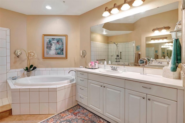 96 Vivante Blvd Unit 96211, Punta Gorda, FL 33950 - bathroom with tiled shower, a garden tub, vanity, and tile patterned flooring