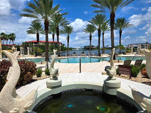 view of pool featuring a hot tub