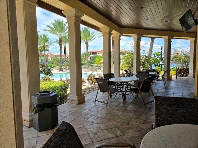 96 Vivante Blvd Unit 96211, Punta Gorda, FL 33950 - view of patio / terrace with outdoor dining space and an outdoor pool