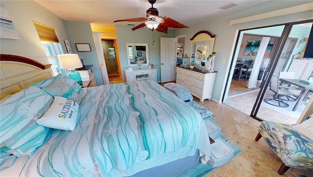 tiled bedroom with a closet and ceiling fan