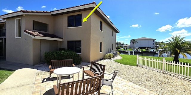 view of patio / terrace with a water view