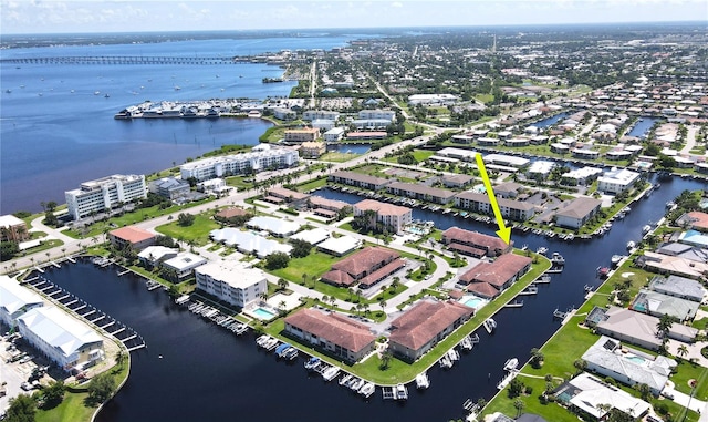 birds eye view of property featuring a water view