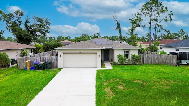 ranch-style home featuring a garage, a front lawn, and solar panels