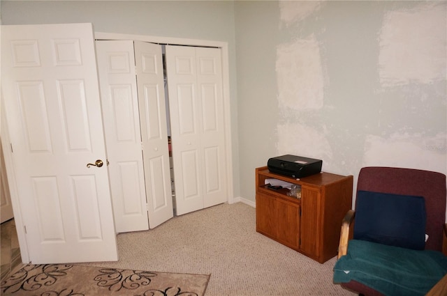 interior space featuring light colored carpet