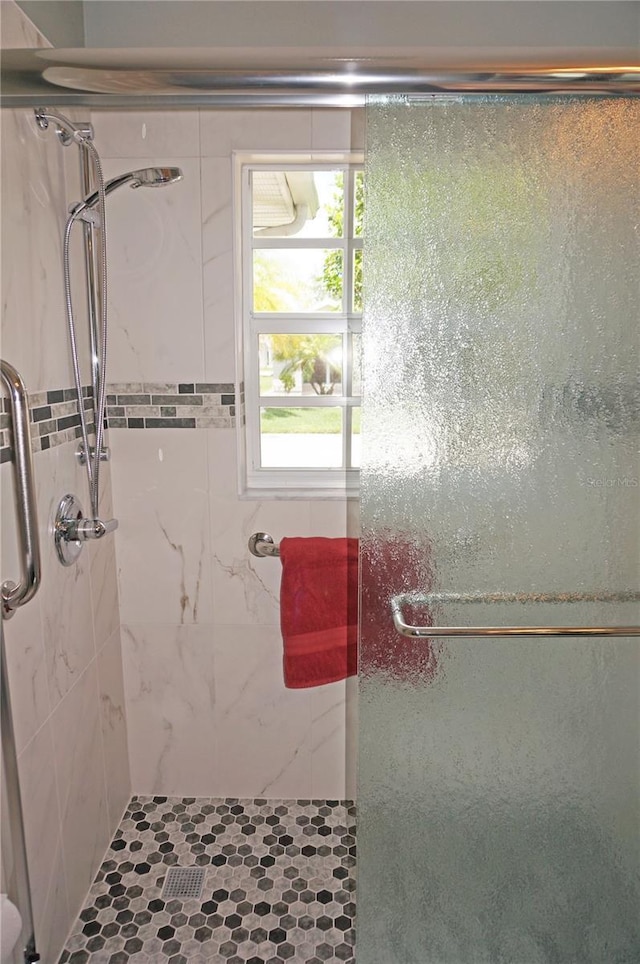 bathroom with walk in shower