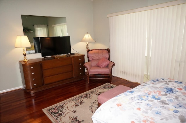 bedroom featuring dark hardwood / wood-style floors