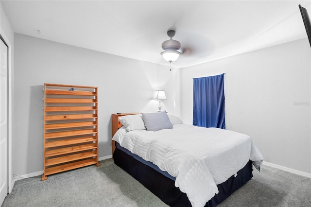 bedroom featuring ceiling fan, carpet floors, and baseboards