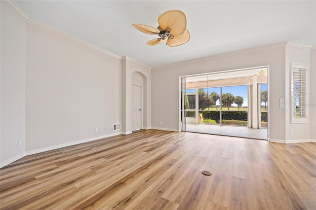 interior space with light hardwood / wood-style floors, ornamental molding, and ceiling fan