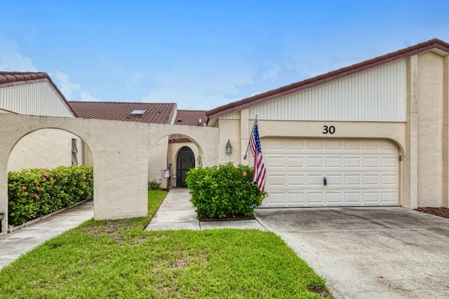 view of front of property with a garage