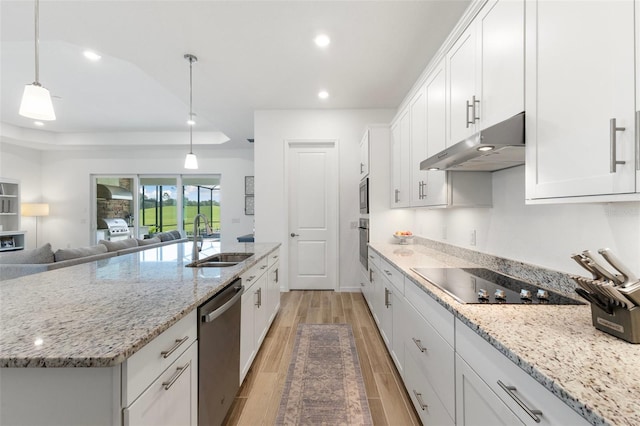 kitchen with white cabinetry, stainless steel appliances, light wood-type flooring, and sink