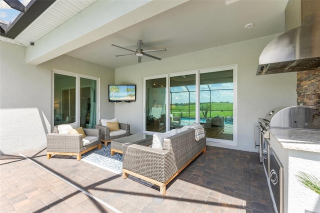 view of patio featuring an outdoor living space and ceiling fan