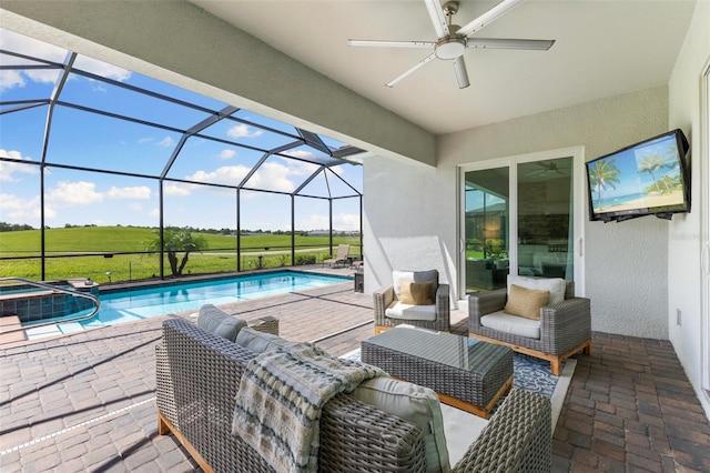 sunroom / solarium with ceiling fan