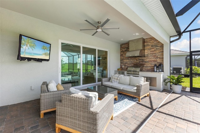 view of patio with a lanai, grilling area, and ceiling fan