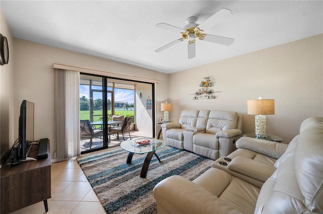 tiled living room featuring ceiling fan