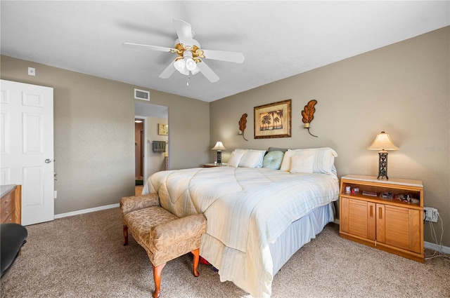 bedroom with ceiling fan and light colored carpet