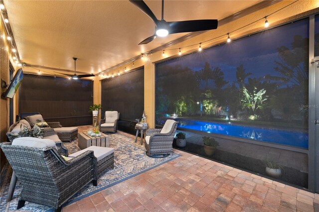 view of patio / terrace with outdoor lounge area and an outdoor pool