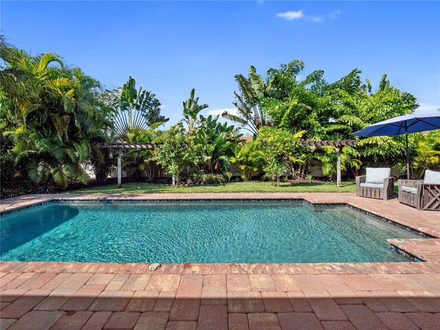 pool with a patio