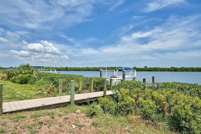 view of dock with a water view