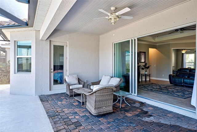 view of patio / terrace featuring ceiling fan