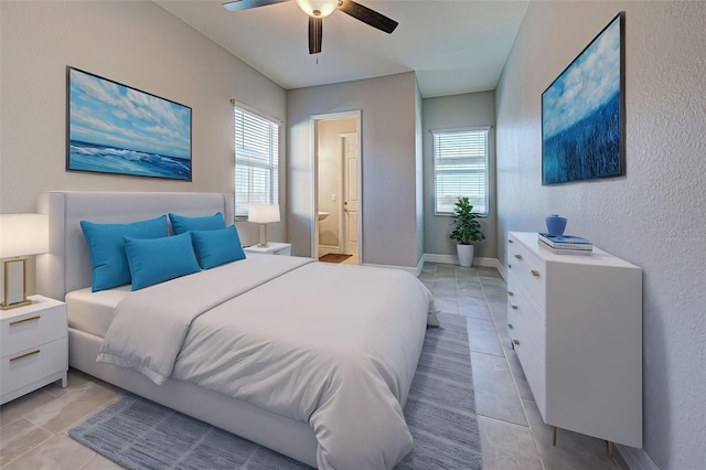 tiled bedroom with ceiling fan and ensuite bathroom