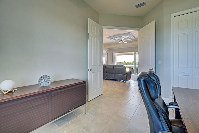 home office with light tile patterned flooring and ceiling fan