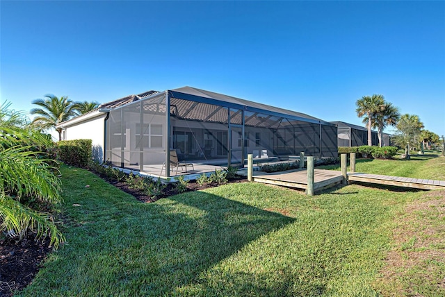 view of yard featuring glass enclosure