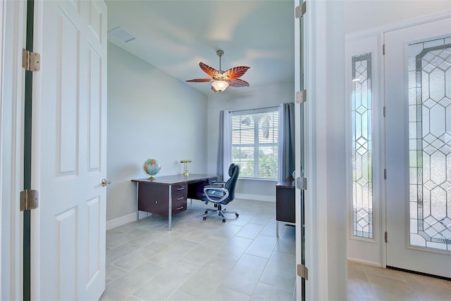 15240 Spanish Point Dr, Port Charlotte, FL 33981 - office area with ceiling fan, visible vents, light tile patterned flooring, lofted ceiling, and baseboards