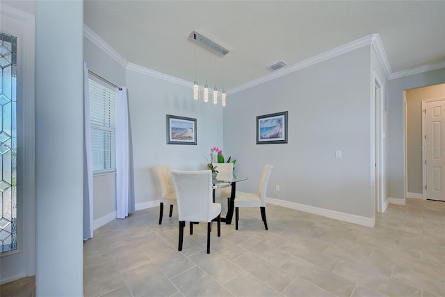 15240 Spanish Point Dr, Port Charlotte, FL 33981 - dining area with baseboards, ornamental molding, and visible vents