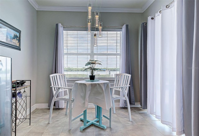 15240 Spanish Point Dr, Port Charlotte, FL 33981 - tiled dining room with crown molding, baseboards, plenty of natural light, and an inviting chandelier