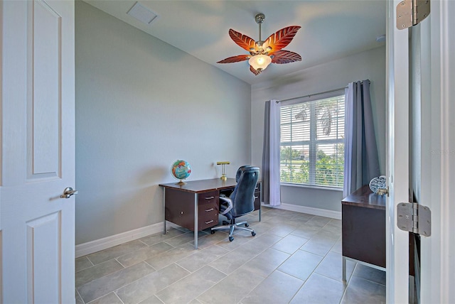 15240 Spanish Point Dr, Port Charlotte, FL 33981 - home office with a ceiling fan, visible vents, vaulted ceiling, light tile patterned flooring, and baseboards