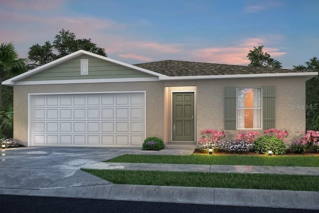 view of front of home with a garage