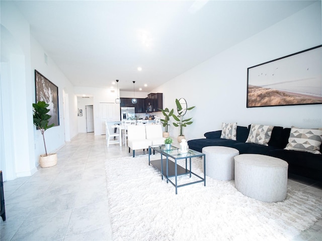 living room with light tile patterned flooring