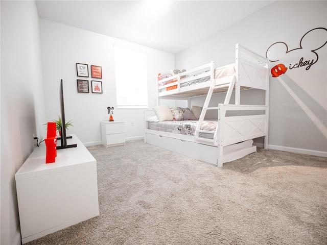 unfurnished bedroom featuring light colored carpet