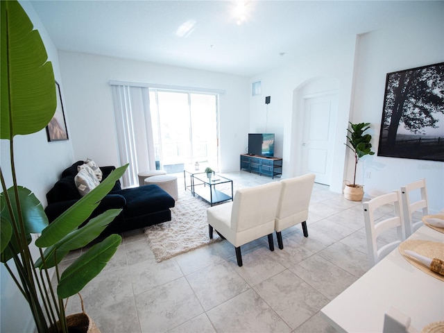 living room featuring light tile patterned floors