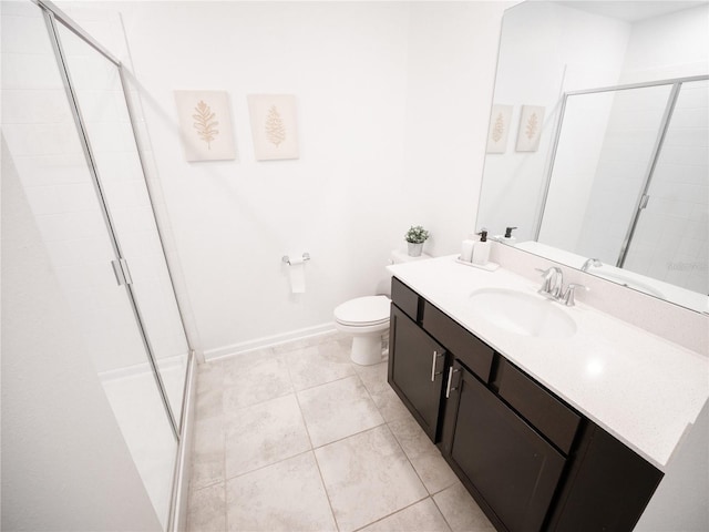 bathroom featuring vanity, toilet, tile patterned flooring, and an enclosed shower