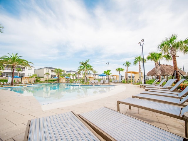 view of swimming pool featuring a patio