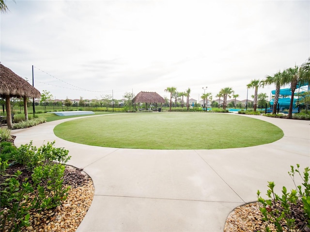 surrounding community with a yard and a gazebo