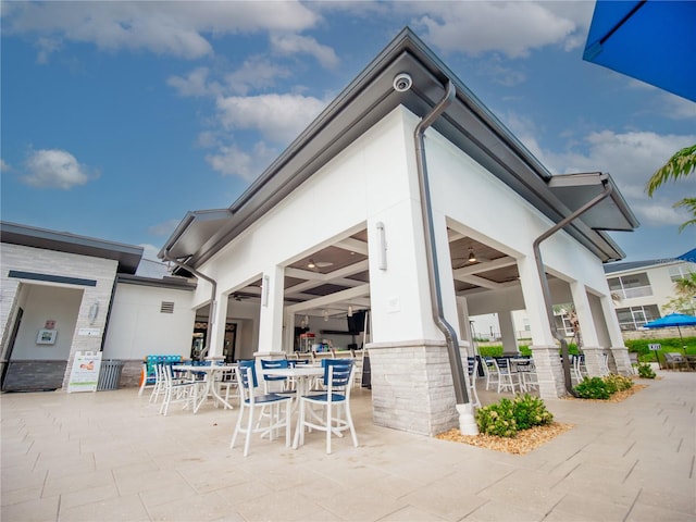 rear view of house featuring a patio area