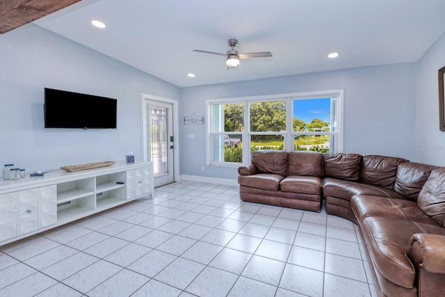 living room with light tile patterned floors and ceiling fan